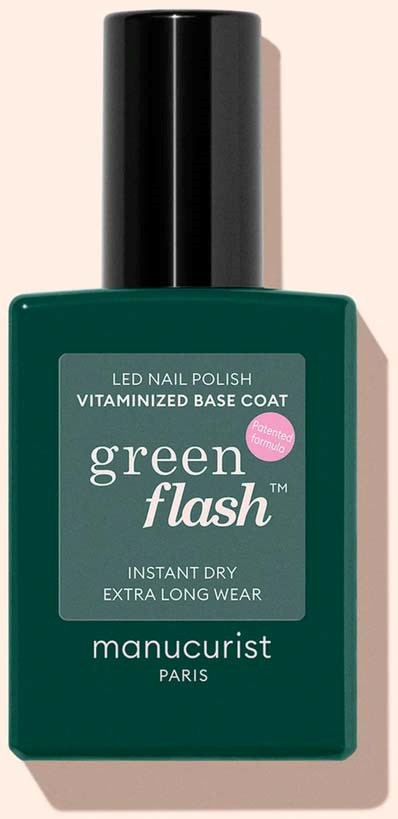 Grønn neglelakkflaske med svart lokk og etikett som sier LED, vitaminerende bas coating, langvarig manicure.