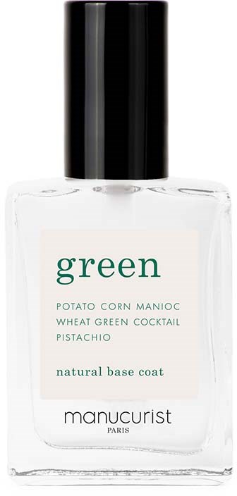 Een doorzichtige fles met zwarte dop bevat groene nagellak, gelabeld als natuurlijke basislaag met pistachenote.