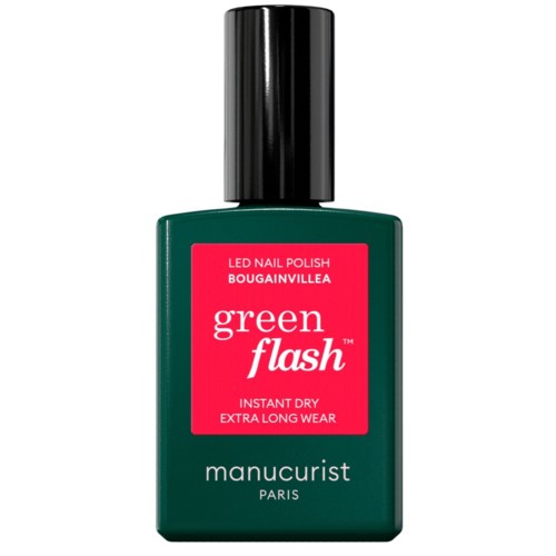 Green nail polish bottle with a black cap, label says it is fast drying and long-lasting.