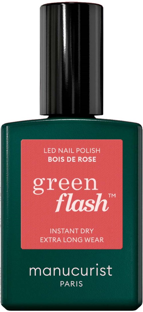 Green nail polish bottle with pink label, black cap, brand Manucurist, Paris. It is for long-lasting, quick-drying nails.