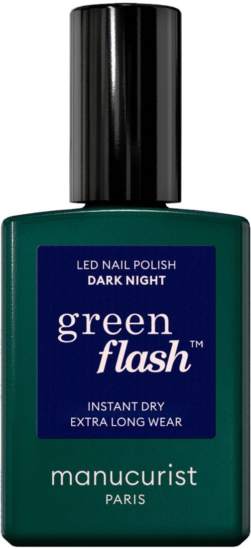 Dark green nail polish bottle with a black cap, labeled 'Green Flash' by Manucurist Paris, for instant dry, long-lasting nails.