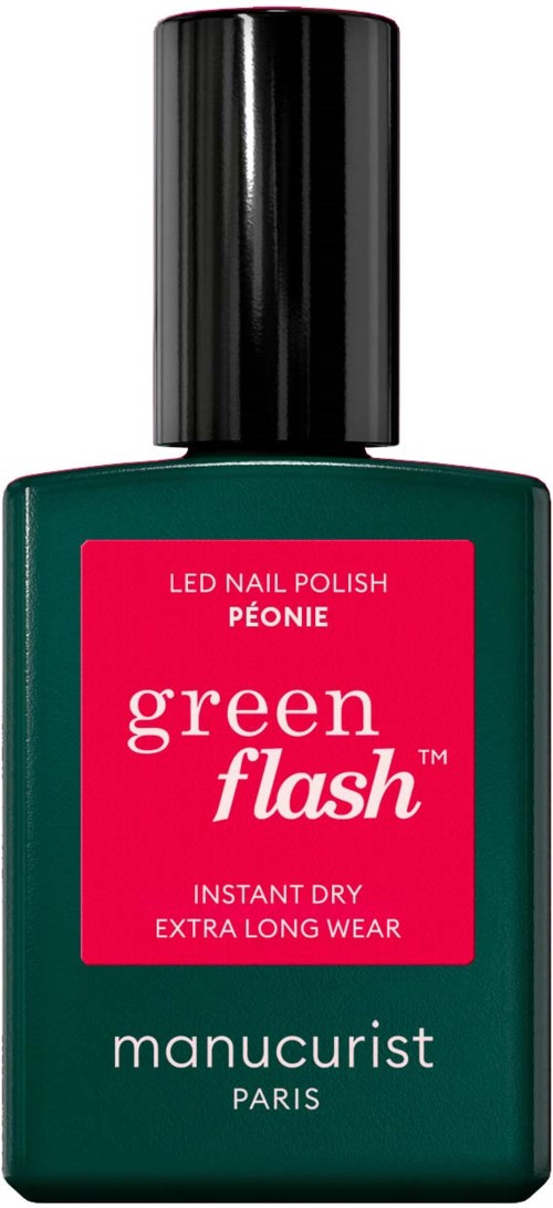A bottle of green nail polish with a black cap. It is called 'green flash' and is from Manucurist Paris.