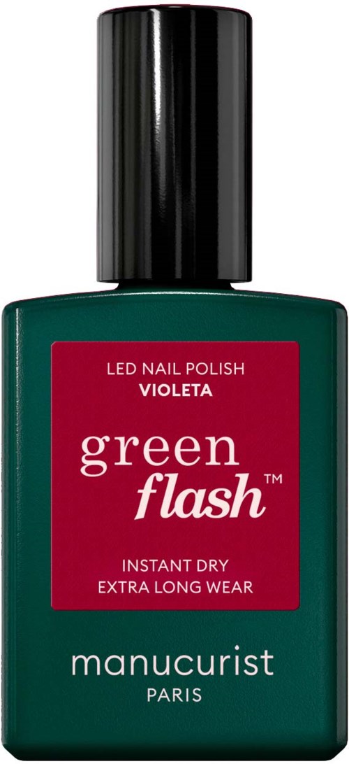 Green nail polish bottle with red label, white text, and black cap. It says 'green flash,' 'LED nail polish,' and 'manucurist.'