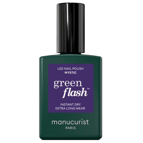 Green nail polish bottle with a black cap and a purple label that says Mystic, Manucurist Paris.