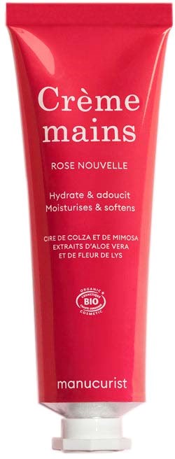 Rod flaska handkräm med vit text märkt Crème mains Rose Nouvelle av Manucurist.