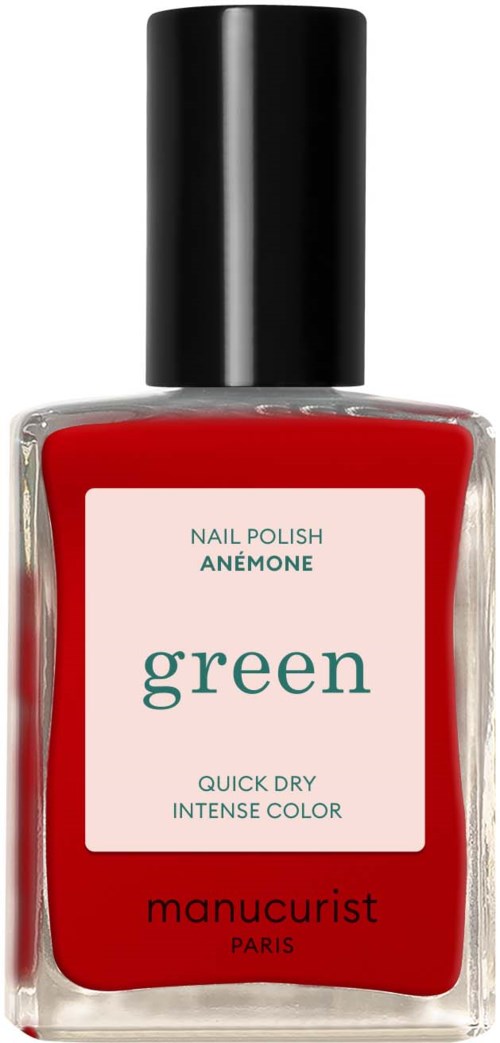 A bottle of red nail polish with black cap and a white label that says "green" and "manucurist PARIS".