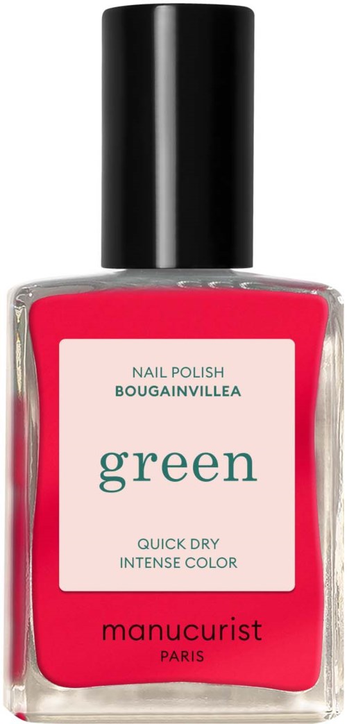 En flaska med rosa nagellack med svart lock. Etiketten säger att det är en grön färg från Manucurist.