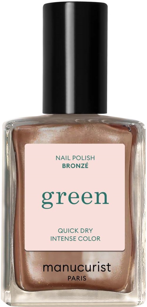 En nagellackflaska i bronsfärg med svart lock, märkt 'green' och 'manucurist Paris'.