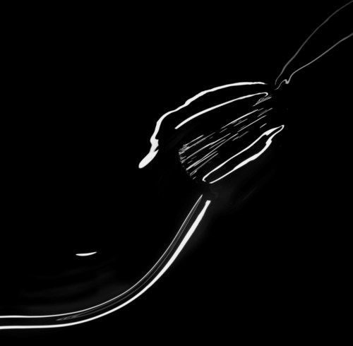 A sketch of a hairbrush with white lines on a black background.