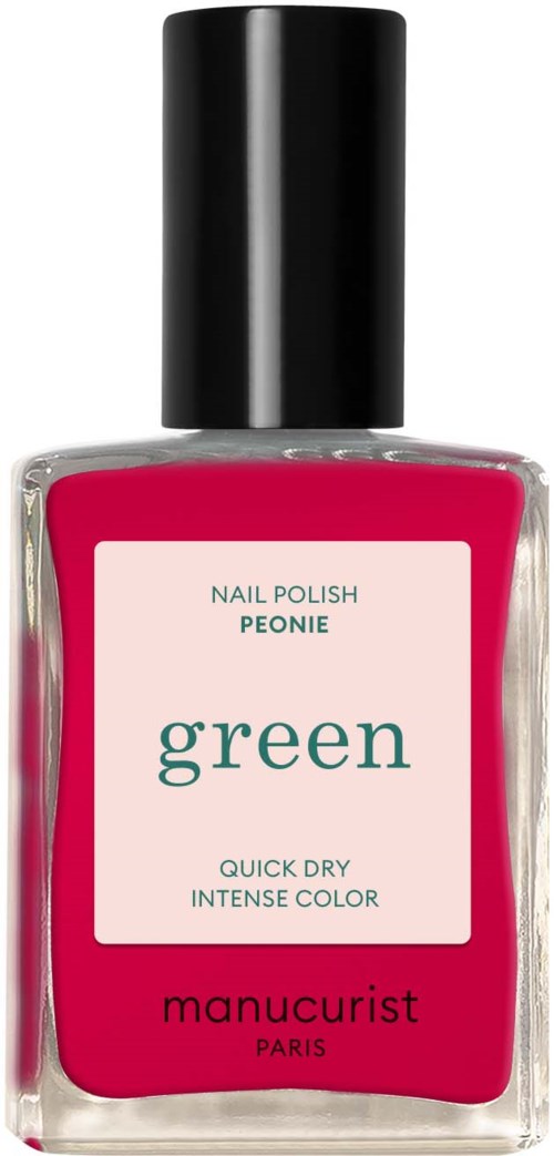 A bottle of bright pink nail polish with a black cap, labeled "green" with information about quick drying and intense color.