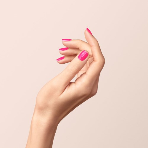 A hand with pink painted nails is shown against a light background, showing fingers slightly curved.