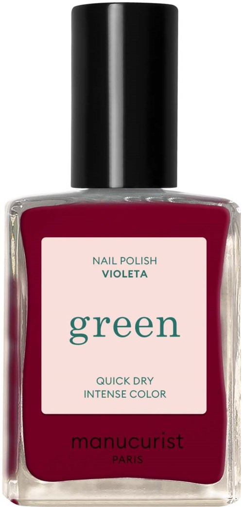A bottle of purple nail polish labeled 'Violeta' and 'green' by manucurist from Paris.