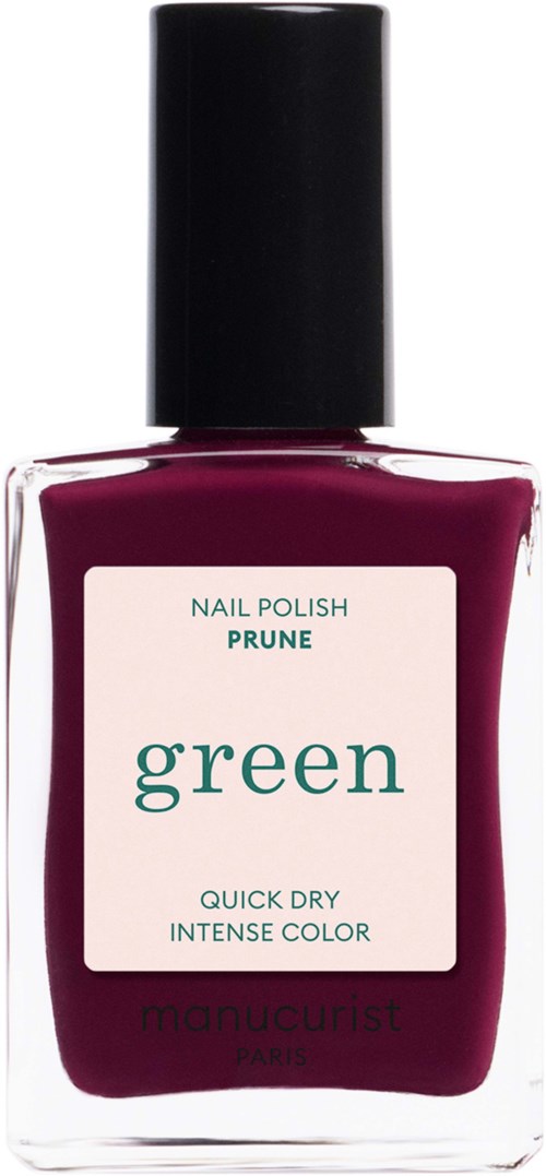 Flaske med lilla neglelakk med hvit etikett som sier green, prune og Monatureist Paris.