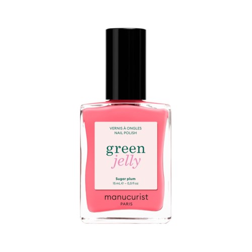 A pink nail polish bottle with a black cap, labeled green jelly, sugar plum flavor, from Manucurist Paris.