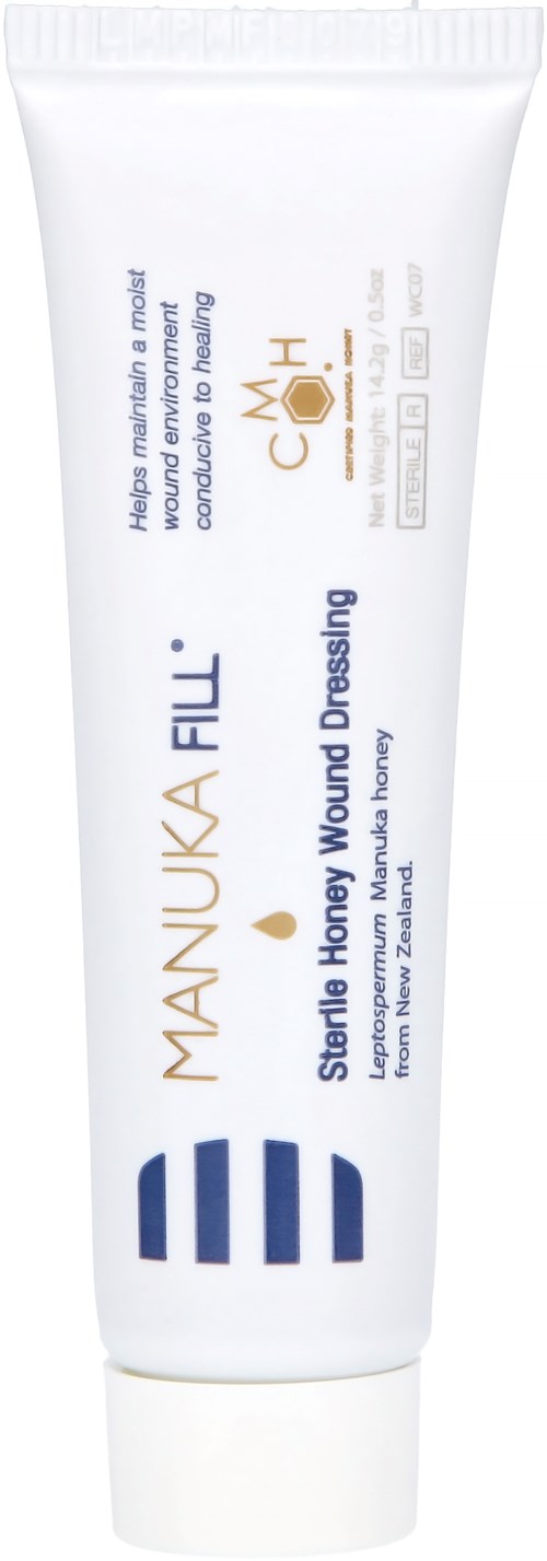 A white tube of NANUKA FILL skincare cream with blue and gold text, promoting honey wound healing for scars.