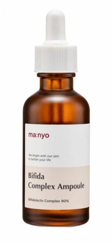 Kleine bruin glazen fles met witte pipet en label, genaamd Bifida Complex Ampoule, voor huidverzorging.