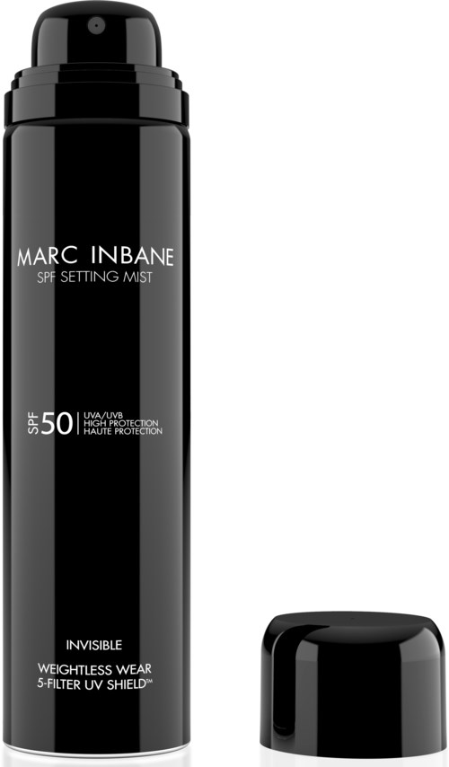 A tall black spray bottle labeled Marc Inbane SPF 50 setting mist with white text and a black cap.