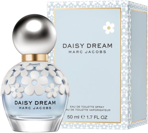 Een parfumfles met bloemenontwerp, zilveren dop en een lichtblauwe doos met bloemen. Het is Daisy Dream van Marc Jacobs.