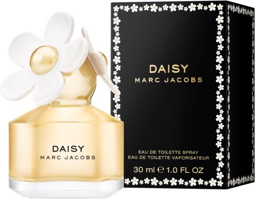 En parfylflaska med vit blomkork bredvid en svart box med prästkragar, märkt 'Daisy Marc Jacobs.'
