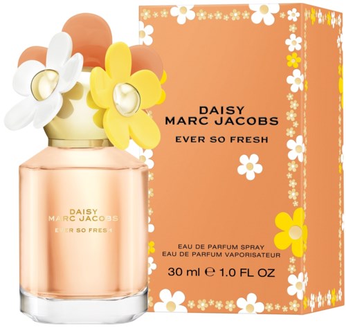 Een parfumfles met gele en witte bloemvormige decoraties en een bijpassend bloemenbox.