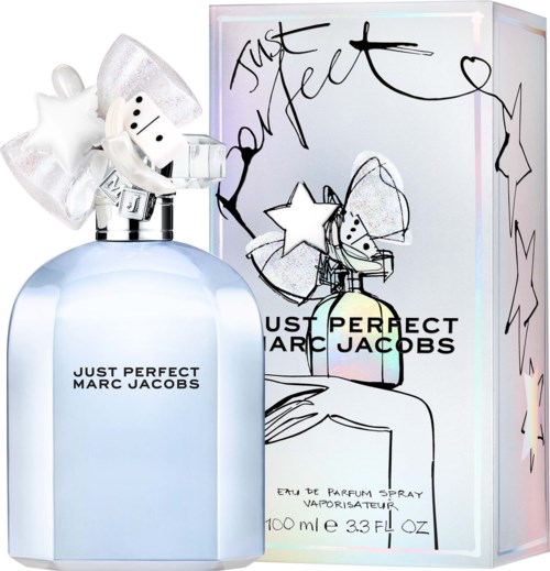 A bottle of perfume with a star-shaped cap and a matching box that has playful sketches and writing.
