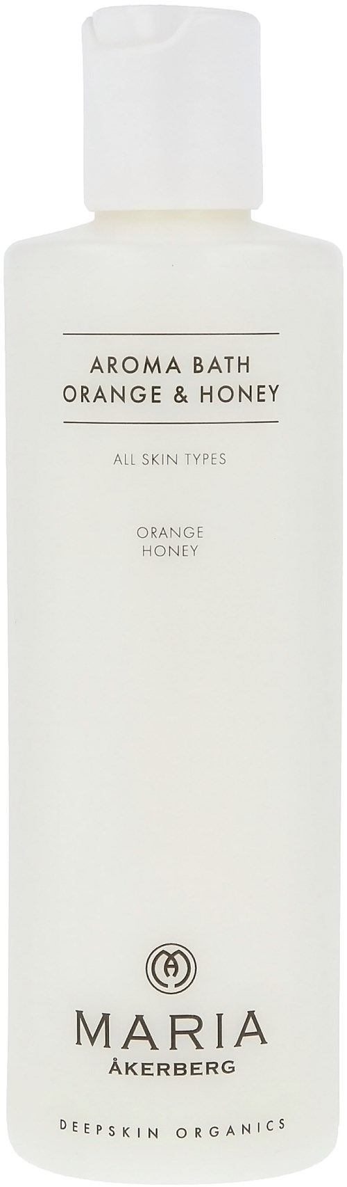 Eine weiße Flasche mit Deckel, gekennzeichnet 'Aroma Bath Orange & Honey' für alle Hauttypen, von Maria Åkerberg.