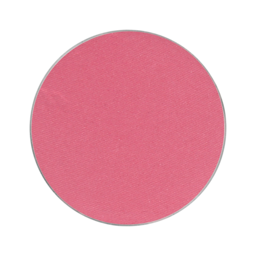 A pink, circular makeup blush or powder with a smooth surface.