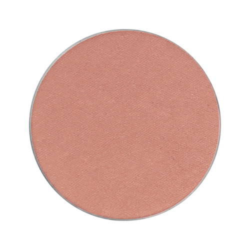 A round makeup blush in a coral or peach shade.