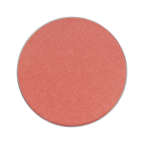 A round, pinkish makeup sponge with a rough texture. No additional objects or details visible.
