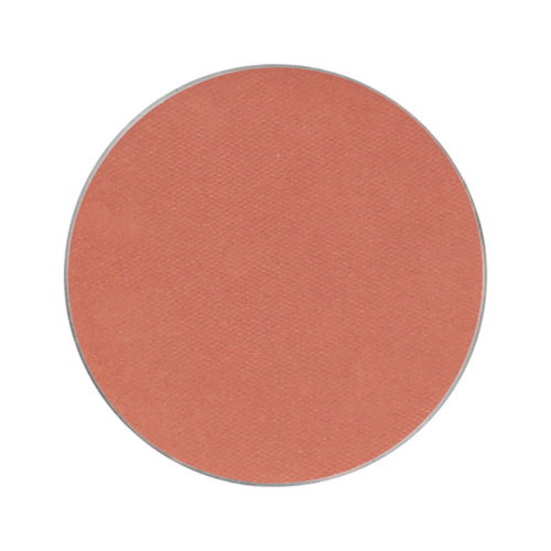 A round, pinkish makeup blush with a matte finish.