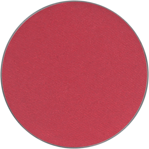 A red circular patch, possibly fabric or a sticker, with a textured surface and gray border.
