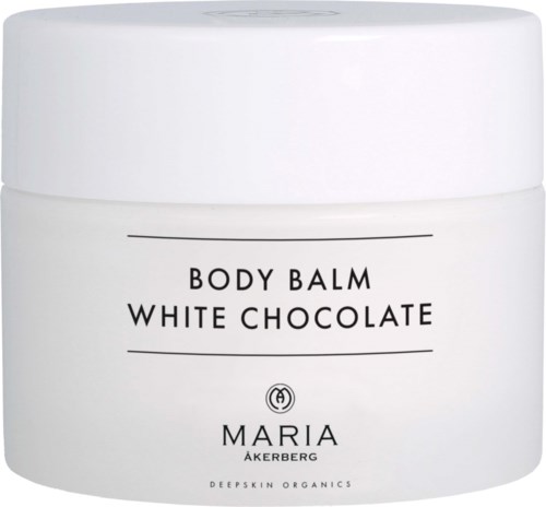 Een witte ronde pot met label 'Body Balm White Chocolate' van Maria Åkerberg. Simpel ontwerp, eenvoudige lettertype, geen extra versieringen.