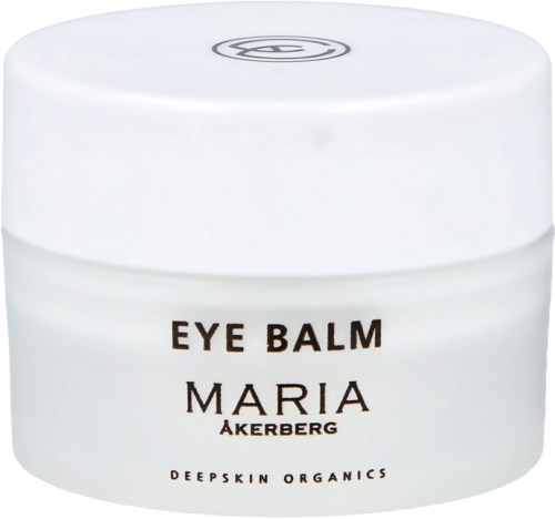 Eine weiße Dose mit der Aufschrift 'Eye Balm Maria Akerberg' mit einem Hautpflegeprodukt.