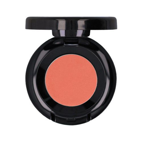 A round makeup blush in a black compact case with lid open, showing peach-colored blush inside.