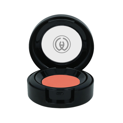 A circular makeup blush in a black compact with a mirror inside lid.