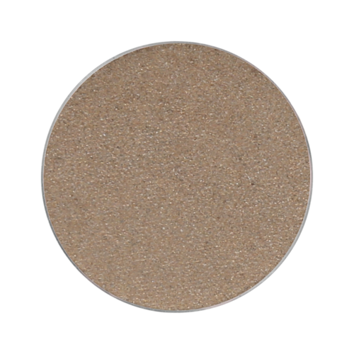 A round, flat, beige, textured surface, resembling a sandy or sandy-colored disc.
