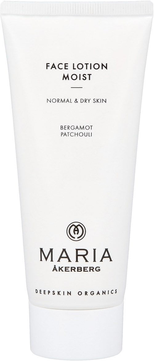 Een witte tube gezichtscrème met zwarte tekst, geschikt voor normale en droge huid, met bergamot en patchouli geur.