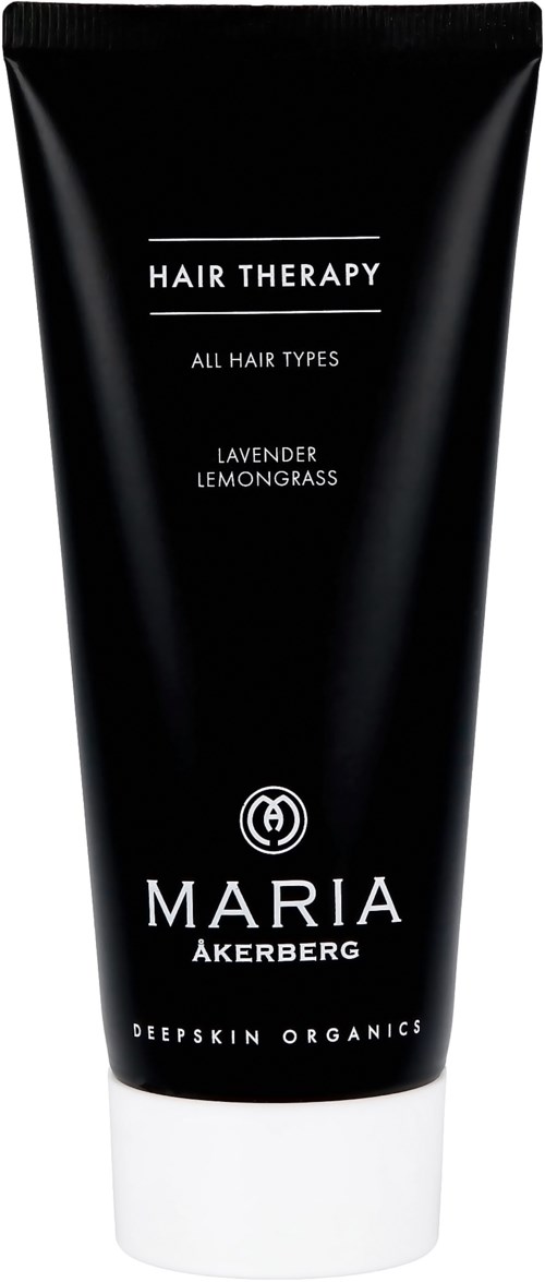 Eine schwarze Tube mit 'Hair Therapy' für alle Haartypen, Lavendel und Zitronengras Duft, von Maria Åkerberg.
