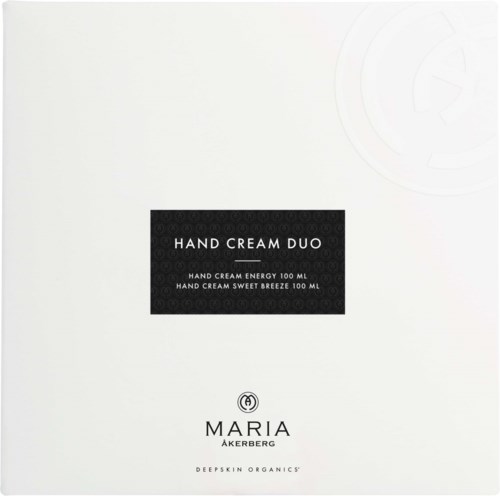 En vit box med svart etikett som handlar om handkrämsduo från Maria Åkerberg och Deepskin Organics.