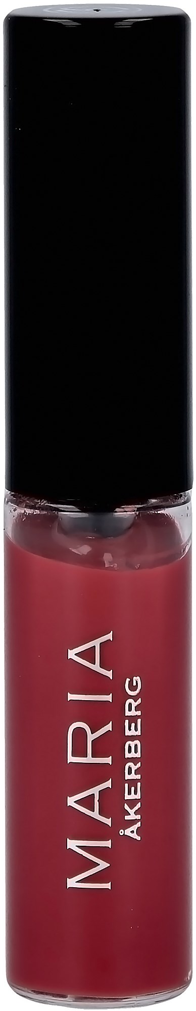 A tube of red lipstick with a black cap and white text reading "MARIA AKERBERG".