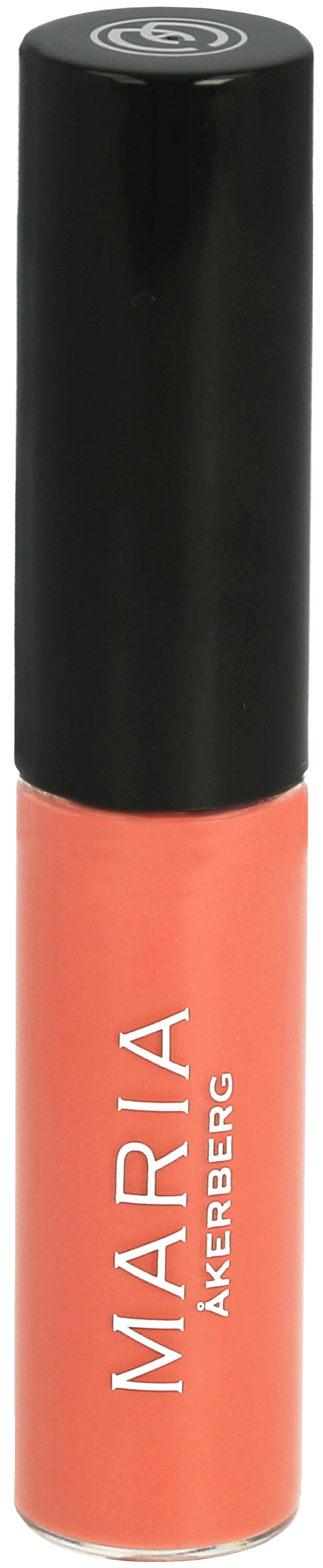 A cylindrical tube with black cap and coral-colored body, labeled 'MARIA AKERBERG'.