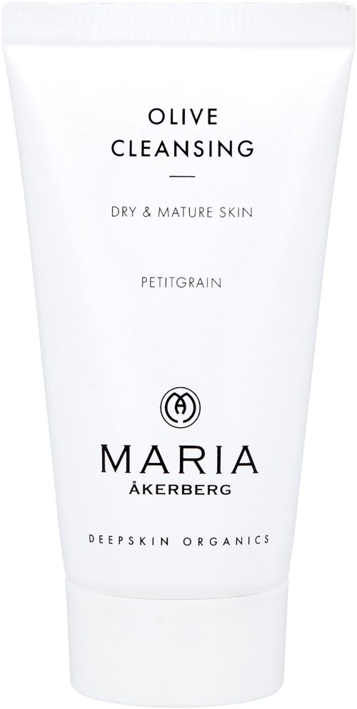A white tube with black text advertising olive cleansing for dry, mature skin by Maria Åkerberg.