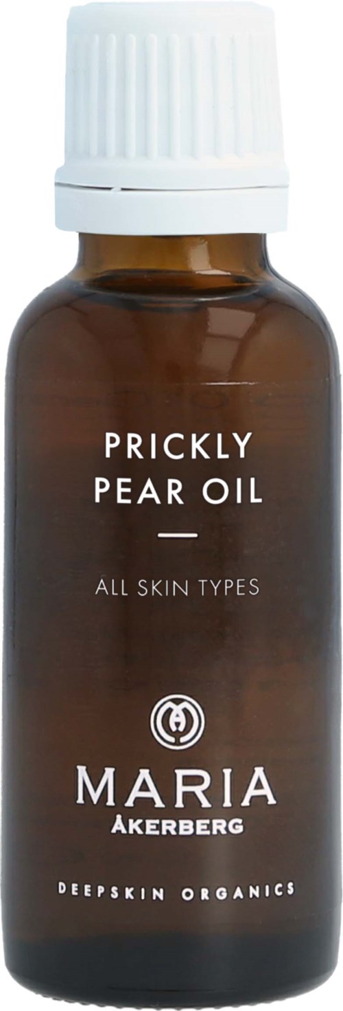A small brown bottle labeled 'Prickly Pear Oil' for all skin types by Maria Akerberg.