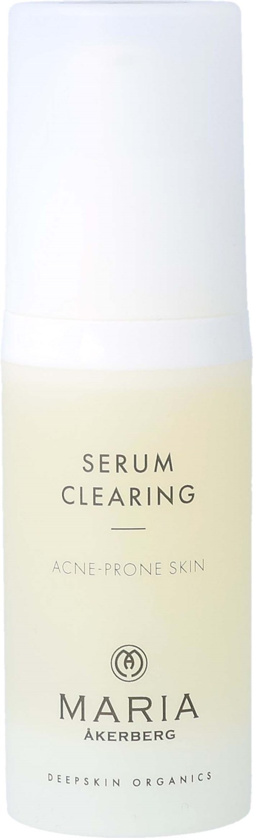 Witte fles met pomp, gemarkeerd 'Serum Clearing' voor acne-gevoelige huid door Maria Akerberg.