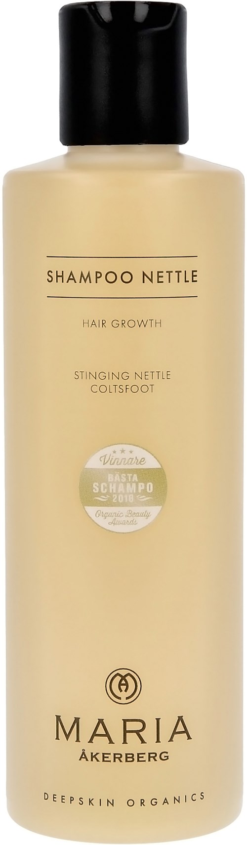 Beige Flasche mit schwarzem Deckel, beschriftet "Shampoo Nettle" für Haarwachstum, von Maria Åkerberg. Bio-Produkt.