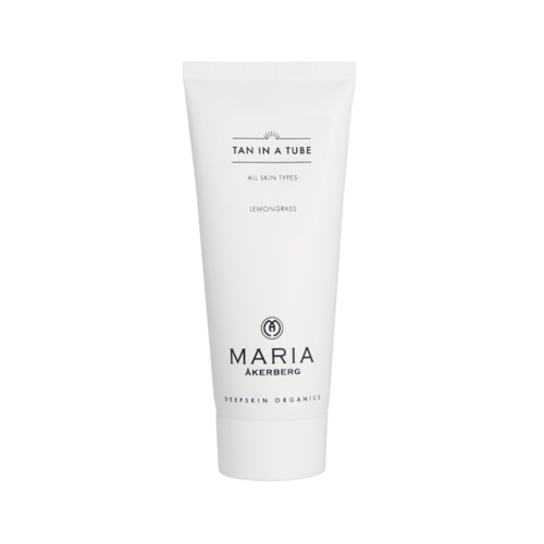 Witte tube met 'TAN IN A TUBE' en 'LEMONGRASS'. Maria Åkerberg-merk, biologisch diepreinigend huidproduct, geschikt voor alle huidtypen.