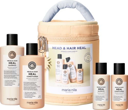 Haarpflegesets mit Flaschen und beige Tragebeutel, alle gekennzeichnet mit Head & Hair Heal von Maria Nila.