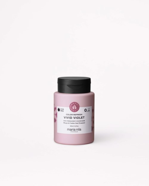 Pink bottle of hair dye named Vivid Violet with a black cap on a white background.