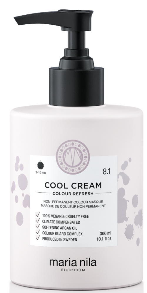 Eine weiße Flasche mit Pumpaufsatz, beschriftet mit 'Cool Cream' von Maria Nila, enthält veganes und cruelty-free Haarfarbenprodukt.