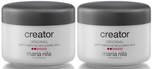 Två burkar av Maria Nila Creator mjuk fibervax, vita behållare med svarta lock.